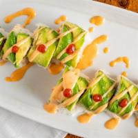 Mexican Special Roll · 8 pieces in spicy crab meat, cooked shrimp, cucumber. 
Top:   avocado.