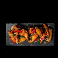 Basil Wings · Chicken wings sautéed in our spicy basil garlic sauce. 10 pieces.