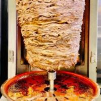 Shawarma Meat · Marinated layers of tenders beef.