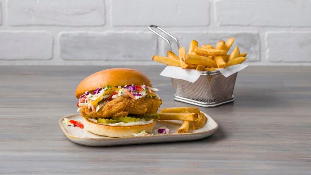 Crispy Chicken Sandwich · Topped with Firecracker Coleslaw, Pickles, and Mayo.