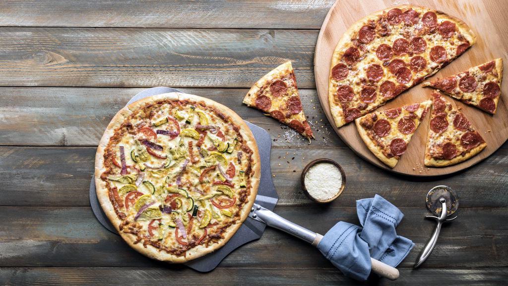 Build Your Own Pizza · Up To 4 Toppings For Free!