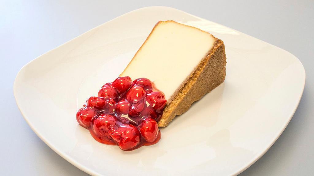 Cheesecake Slice · Creamy cheesecake slice with a graham cracker crust. Choose Plain or topped with Cherries.