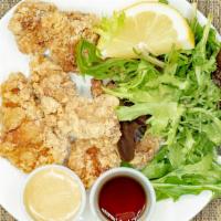 Chicken Karaage · Japanese style deep fried chicken with salad.
