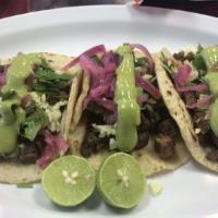 Combo 3 Tacos · Your choice of 3 tacos served with rice and refried beans (regular or pork).