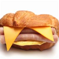 Bacon, Ham & Egg Croissant · Fresh, flaky croissant with bacon, ham, eggs, and cheese.