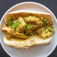 Sandwich · A Somali take on the sandwich — Freshly baked bread with bajiyya (vegan/veg), curried chicke...