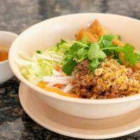 Bún Thịt Nướng - Bbq Pork & Vermicelli · BBQ pork over vermicelli, lettuce, and bean sprouts topped with cucumber, cilantro, and two ...