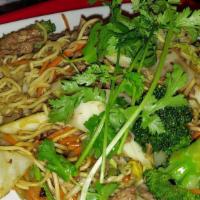 Mì Xào - Stir-Fry Egg Noodles · Choice of beef, chicken, or shrimp with egg noodles, carrots, broccoli, Napa cabbage, and be...