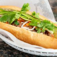 Bbq Pork · Our BBQ Pork Banh Mi comes with our special butter, Daikon (Pickled carrots + radishes), cuc...