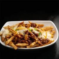 Chili Cheese Fries · Fries topped with beef chili, cheese sauce, and shredded cheddar