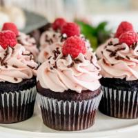 Chocolate Raspberry Cupcake (1) · Our rich chocolate cupcake topped with raspberry buttercream (yes, we use real raspberries!)...