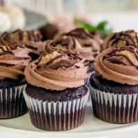 German Chocolate Cupcake (1) · Our gooey chocolate cupcake topped with homemade German chocolate filling (a combination of ...