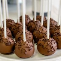 Double Chocolate Cake Pop · A chocoholics dream! Our chocolate cake covered in chocolate and garnished with chocolate sp...