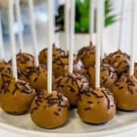 Salted Caramel Cake Pop · Our delicious chocolate cake, dunked in a salted caramel shell, and decorated with chocolate...