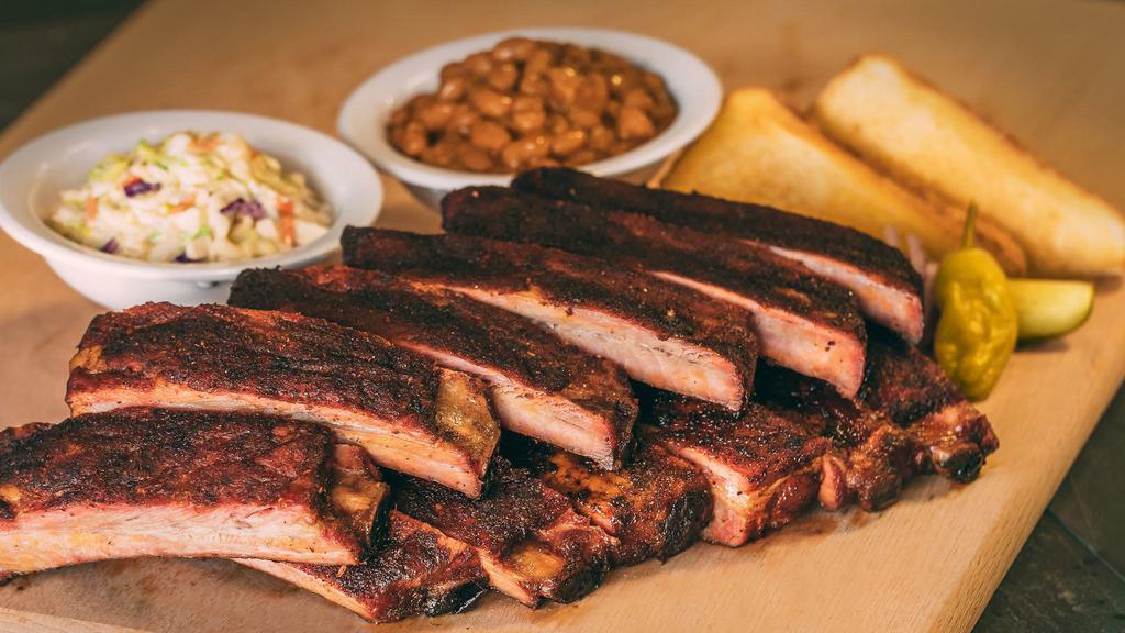 Full Rack Platter · Includes a full rack of  St. Louis Style Ribs and 2 sides.