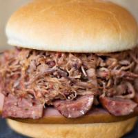The Heisman · Piled high with bologna, hot links & pulled pork or brisket.