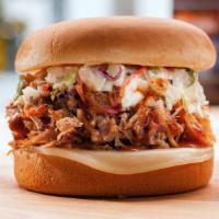 Triple 20 · Our tasty pulled pork drizzled with Billy’s Secret Sauce, topped with coleslaw & provolone c...