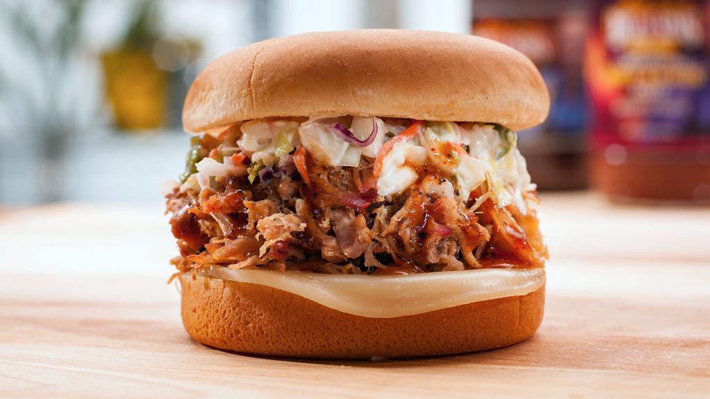 Triple 20 · Our tasty pulled pork drizzled with Billy’s Secret Sauce, topped with coleslaw & provolone cheese. Includes 1 of our delicious sides, pickle, pepper, onion & our famous BBQ sauce.