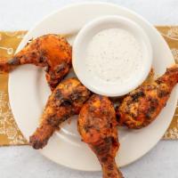 Drumsticks · Sicilia Pizza Kitchen favorite: Baked in hot sauce or BBQ sauce dip with ranch or blue cheese.