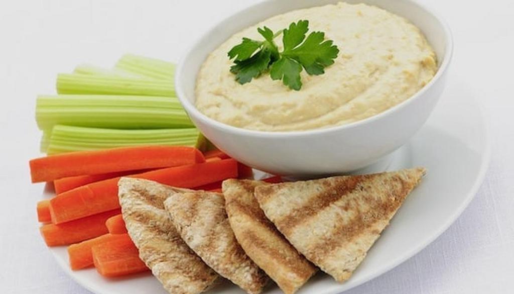 Roasted Red Pepper & Garlic Hummus · Served with Pita Points and Vegetables