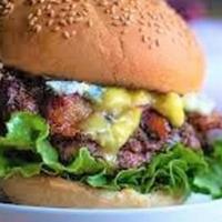 Bacon Bleu Burger · 6-ounce  ground Chuck patties made In-House with Bacon, Bleu Cheese Dressing, . Grilled Onio...