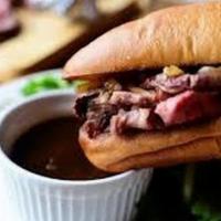 Beef Dip · 6 oz thinly sliced steak, grilled onions,            provolone cheese on a hoagie with Au Ju...