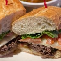 Bookmaker'S Cheesesteak · 6 oz thinly sliced steak with grilled onions,   peppers, mushrooms, Provolone cheese, . lett...