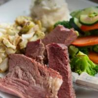 Corned Beef & Cabbage · Guinness-Braised Corned Beef Brisket, Buttered Cabbage, Garlic Mashed . Potatoes, Seasonal V...