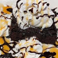 Fudge Brownie · Warm fudge brownie topped with caramel and chocolate sauce