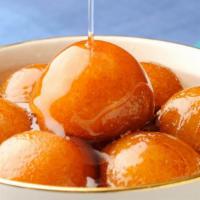 Gulab Jamun · Homemade cheese cooked in fresh tomato sauce, butter and mild Indian spices.