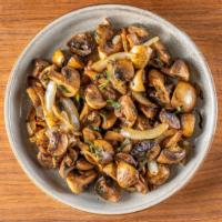 Peppered Mushrooms · Stir fried mushroom medley with curry leaves, spices, onions & garlic.