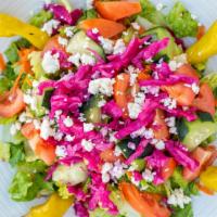 Greek Salad · Lettuce, cucumber, tomato, pepperoncini, red onions, bell pepper, black olives and feta chee...