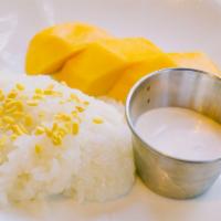 Mango Sticky Rice  · Sweet sticky rice with mango and coconut creamy sauce