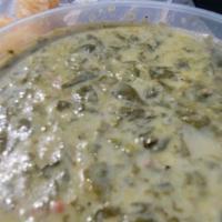 Callaloo · Creamy spinach and okra soup with coconut milk.
