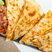 Broadlands Quesadilla · Smoked chicken or smoked pork peppers and onions, pepper jack and cheddar cheese, served in ...