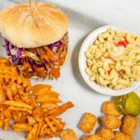 Smoked Carolina Pulled Pork · Dry Rubbed Carolina Pulled Pork topped with Crispy Cole Slaw with your choice of BBQ sauce