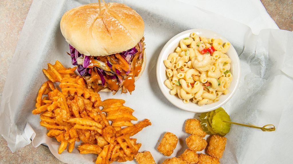 Smoked Carolina Pulled Pork · Dry Rubbed Carolina Pulled Pork topped with Crispy Cole Slaw with your choice of BBQ sauce