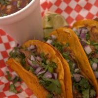 Birria Tacos · 4 tacos y consome. tacos with shredded beef and cheese.