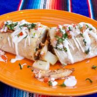 Breakfast Burrito · Available all day! Two eggs, potatoes, cheese, pico, guacamole & sour cream. Choice of prote...