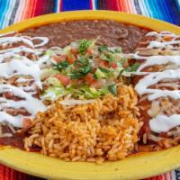 Tamale Plate · Gluten-Free. 2 fresh tamales stuffed w/chicken Smothered in a red or green sauce, cheese & s...