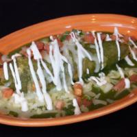 Tamale · Red or green sauce, Chicken, cheese, sour cream & pico.