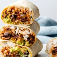 Veggie Burrito · Two scrambled eggs, spinach, avocado, cremini mushrooms, tomatoes, caramelized onions, Morty...