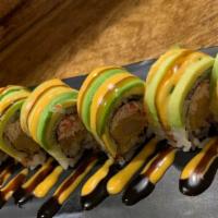 34-Dragon Fly · Shrimp, crunch, snow crab, cucumber topped with avocado with spicy mayo and eel sauce.