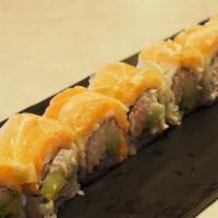 42-Ichi · Crab meat, cucumber and avocado topped w/salmon, lemon and ponzu sauce.