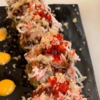 60-Super Volcano(Deep Fried) · Tuna, cream cheese, avocado topped with spicy show crab, masago, eel sauce and spicy mayo.