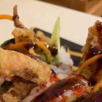 62-Spider Roll · Soft shell crab, cucumber, avocado, lettuce and masago.