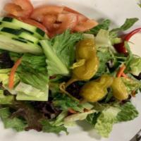 House Salad · Lettuce, tomatoes, cucumbers, pepperoncini, carrots.