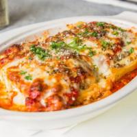 Lasagna · Layers of beef, Italian sausage, Ricotta and Mozzarella.