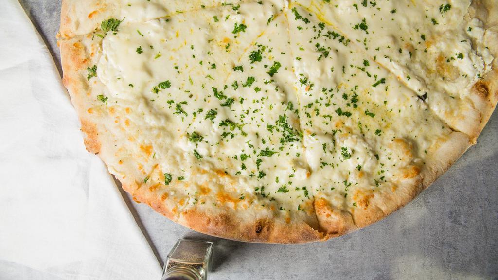 White Pizza · Garlic, Olive oil, Ricotta, Mozzarella and Parmesean