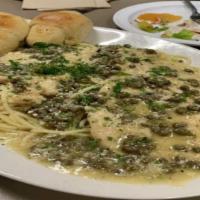 Chicken Piccata · Sauteed Chicken breast with capers, lemons, white wine sauce